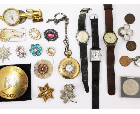 A mixed lot to include vintage brooches, a compact, three wristwatches, a gold plated pocket watch etc.