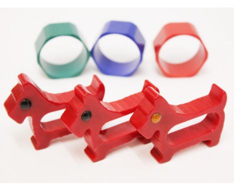 A set of three vintage scottie dog bakelite napkin rings and three others