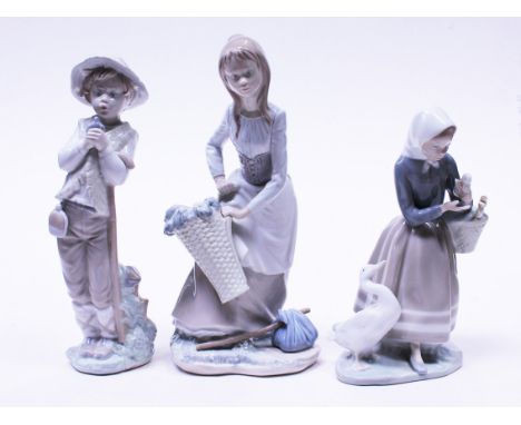 Two Nao and one Lladro figures