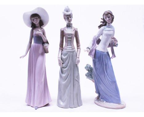 Two Nao figures and another
 