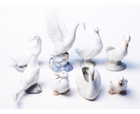 A group of eight Nao bird ornaments