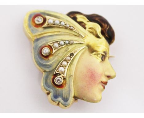 An Art Deco diamond seed pearl and enamelled yellow metal brooch formed as a masked lady. Approx. diamond wt. 0.15 carats. Un