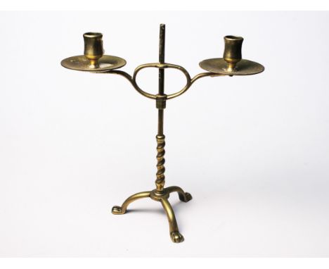 A Georgian adjustable brass candlestick. H30cm