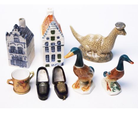 A mixed lot comprising two Beswick ducks, a Wade Beneagles whisky, a Royal Worcester miniature, two thimbles and two KLM hous