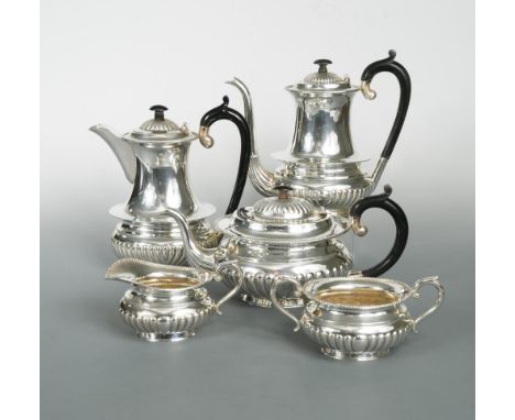 A continental metalwares five piece tea and coffee set, of possible Indian origin, and in the Queen Anne style, each piece ma