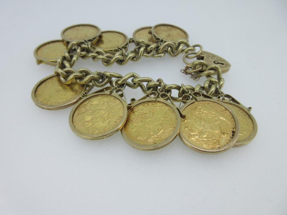 A 9ct gold charm bracelet with ten half sovereigns, the curb link ...