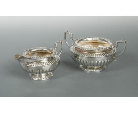 Dublin - A George lll silver two handled sugar basin and matching milk jug, the basin by James Fray, 1814, of circular form, 