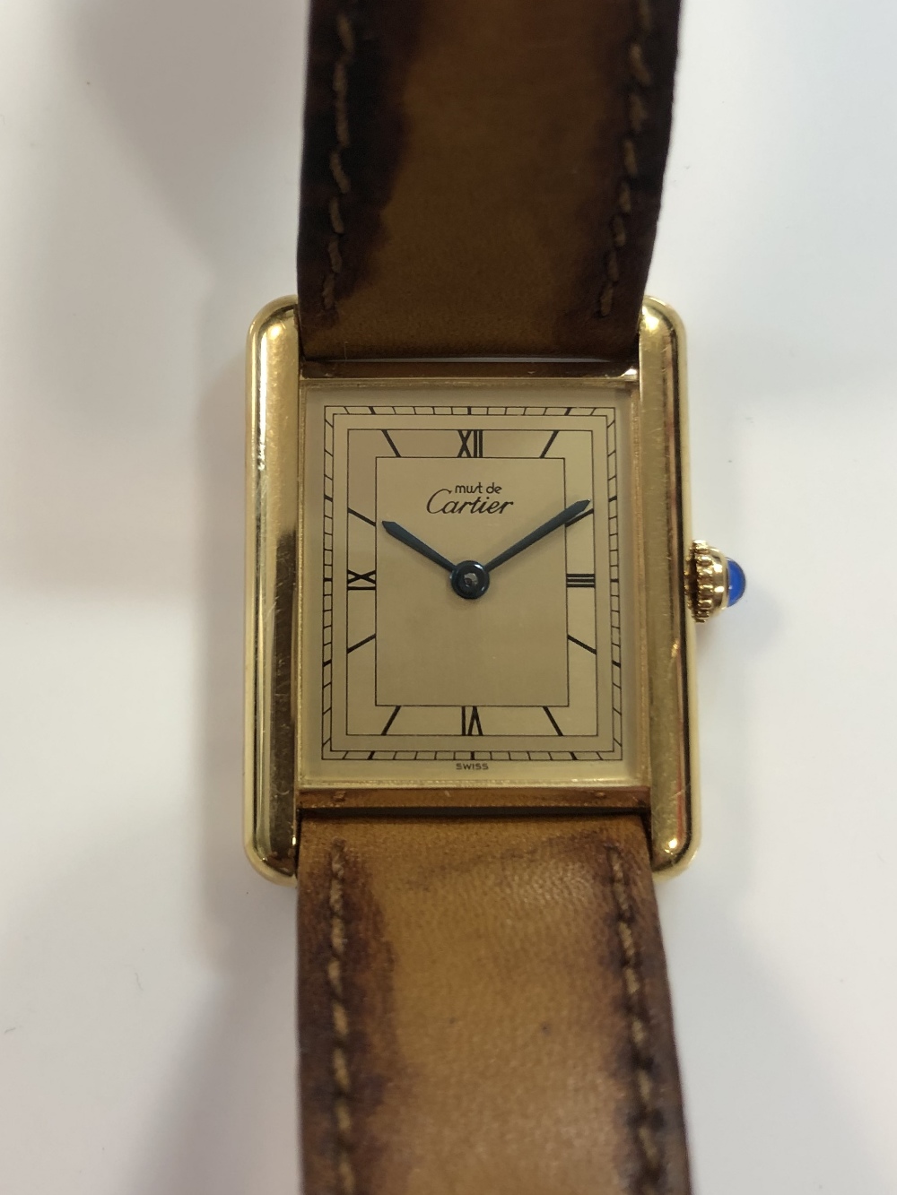 Cartier - A vermeil 'Les must de Cartier' 'Tank' wristwatch, circa 1985 ...