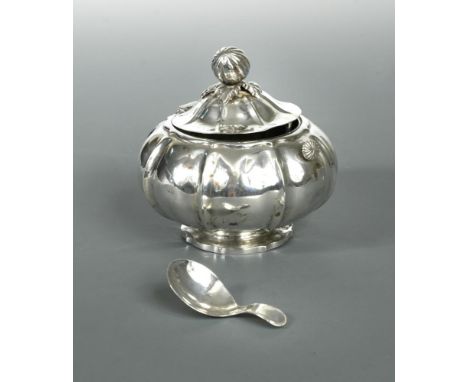 A Dutch metalwares silver tea caddy and spoon, marked with lion passant stamp indicating minimum silver standard of 833/1000 