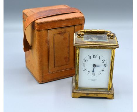 A Brass Cased Carriage Clock retailed by The Goldsmiths and Silversmiths Company with lever escapement and outer case 