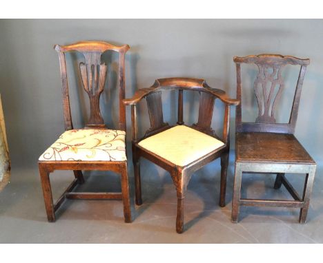 A George III Oak Corner Armchair together with two similar Chippendale style side chairs 