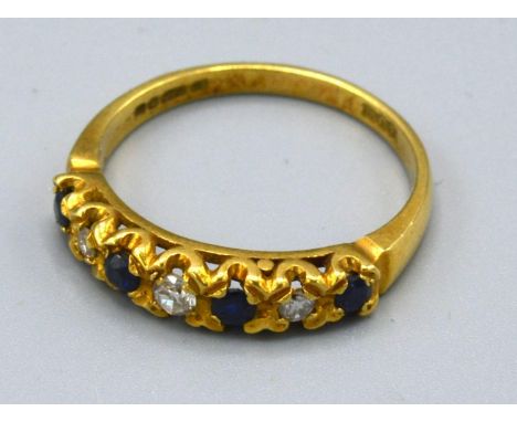 An 18ct. Gold Diamond and Sapphire Half Eternity Ring, 3.8 gms, ring size Q 