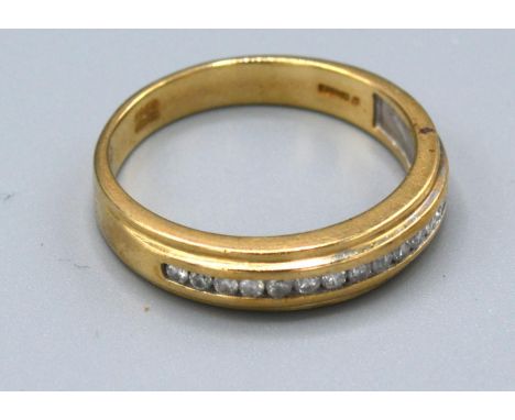 A 9ct. Gold Diamond Half Eternity Ring, 3.7 gms, ring size R 