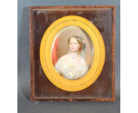 An Early 19th Century Portrait Miniature 'Study Of A Girl In Period Dress' within oval frame 13 x 10 cms 