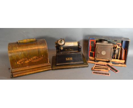 A Thomas Edison Gem Phonograph together with a Magic Lantern with slides 