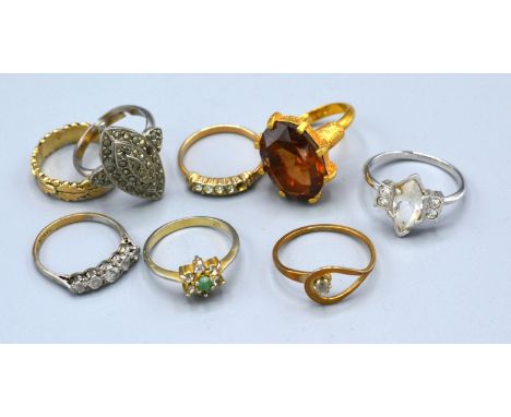 A 9ct. Gold and Silver Dress Ring together with seven other dress rings 