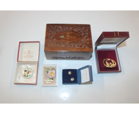 An enamel decorated brooch; a floral encrusted brooch; one other and a pair of ear-rings 