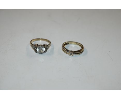 A 9ct white and yellow gold diamond set ring, ring size K, approx. 2gms; and a 9ct gold ring set with white stones, size K ap