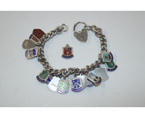 A Sterling silver watch chain, charm bracelet, and enamel souvenir charms, approx. 46.5gms total weight 