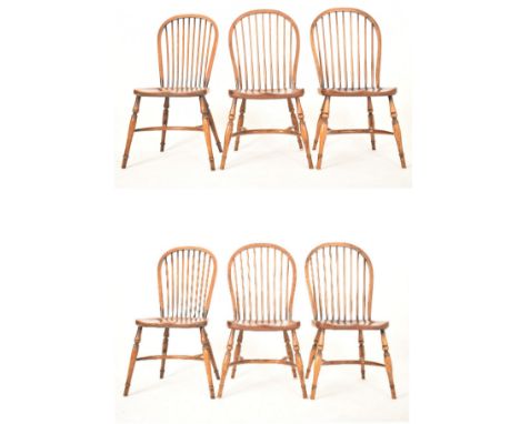 Stewart Linford Furniture - A set of four plus two (matched) Windsor style yew &amp; elm wood stick back dining chairs. Each 