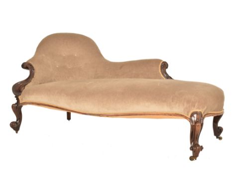 A 19th century Victorian Chesterfield mahogany chaise lounge settee. The chaise lounge having a quart curved button backed ba