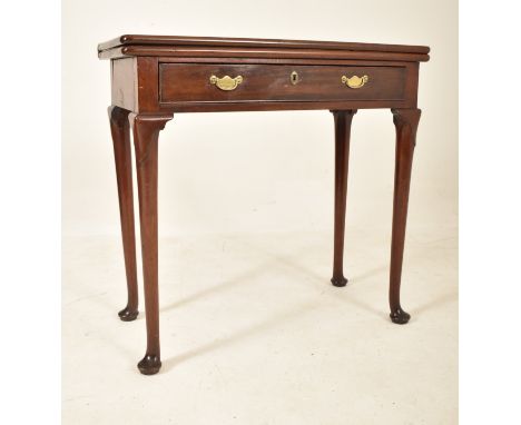 An 18th century&nbsp;George III mahogany folding card / games table. Mahogany rectangular form with hinged lid folding moveme