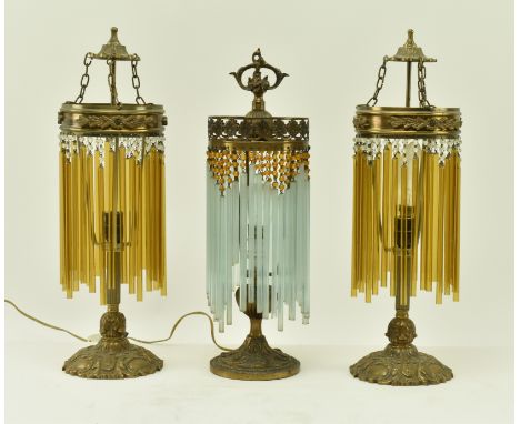 Three Art Deco inspired mid 20th century gilt metal &amp; glass rod desk mantle lamp lights. The lot to include a pair of des