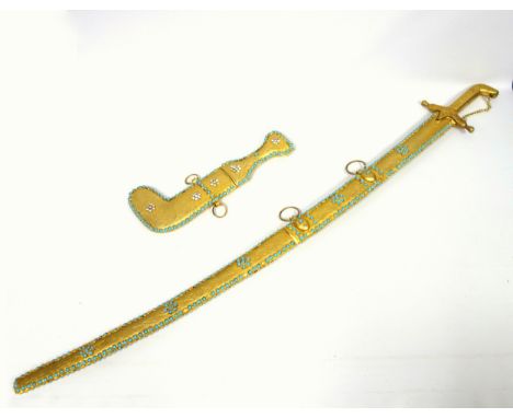 Eastern sabre with a gilt metal hilt, in a turquoise encrusted scabbard, L.98cm overall, and a similar dagger in sheath, L.30