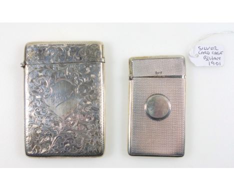 Edwardian silver engine turned card case with a vacant cartouche, by W H, Birmingham, 1901, H.8.1cm, and a floral engraved ca