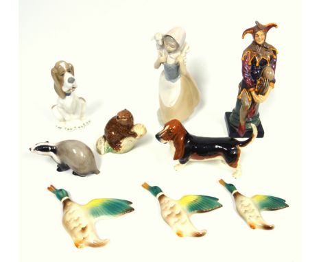 Doulton figure "The Jester", HN 2016, H.26cm; badger, L.14cm; Beswick dachshund, L.20cm; Beaver, H.11cm; Nao group of girl wi