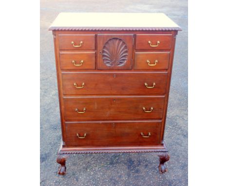 Early 20th American Chippendale style carved mahogany chest with a gadrooned top, shell panel door flanked by 4 short drawers