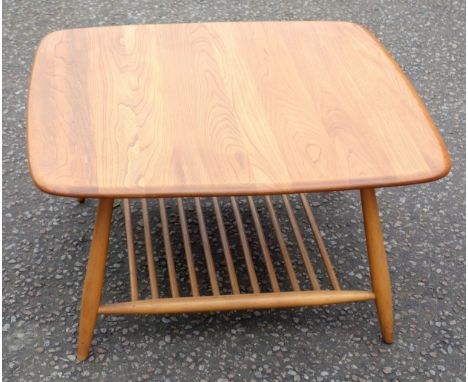 Ercol coffee table with a rounded square light elm top, birch spindle undertier and tapering legs, 40 x 75 x 75cm 