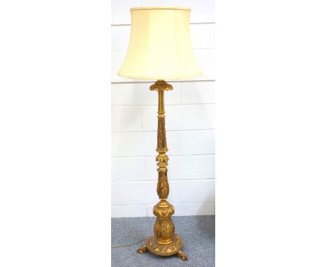 Italian carved giltwood lamp standard with a foliate baluster column on a circular base, 3 spreading feet, H.145cm 