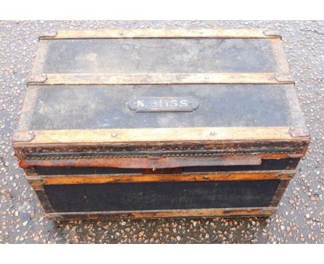 Brass studded leather canvas and ash bound trunk with a hinged top and side carrying handles, and name plaque 'N Bliss', 45 x