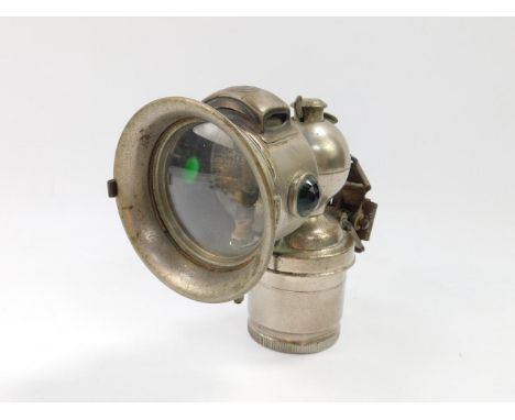 A Miller Carbide bicycle lamp.