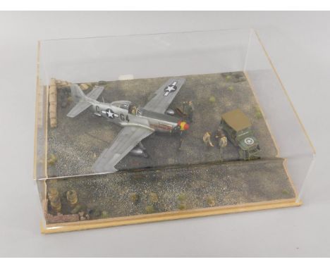 A die cast diorama of a WWII P-51K Mustang 'Nooky Booky IV', flown by Major Kit Carson, 362nd Fighter Squadron, scale 1:48, p