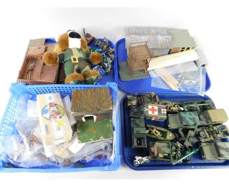 A selection of toy soldier accessories, model Army vehicles, etc, (4 trays).