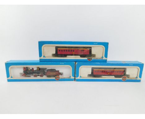 A Hornby HO scale Union Pacific locomotive with tender, No 119, 4-4-0, 54171-8, a Wild West Adventure exploding car, and a Wi