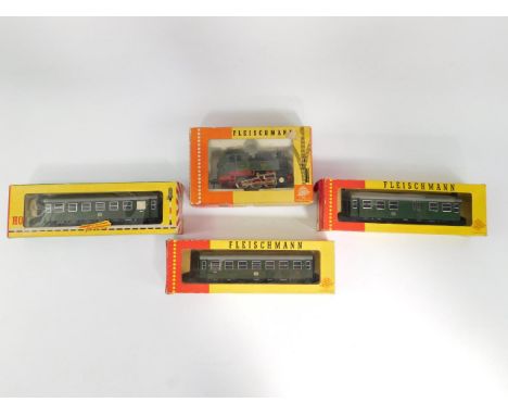 A Fleischmann HO gauge model of a shunting engine, Carl, 4028, two coaches, 1407, and a further coach, 1408, all boxed, (4).