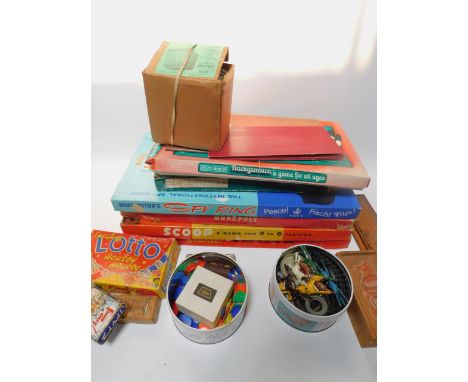 A Staunton chess set, lead Totopoly figures, H & M Powapack Transformer Rectifier Unit, cribbage board, and various board gam