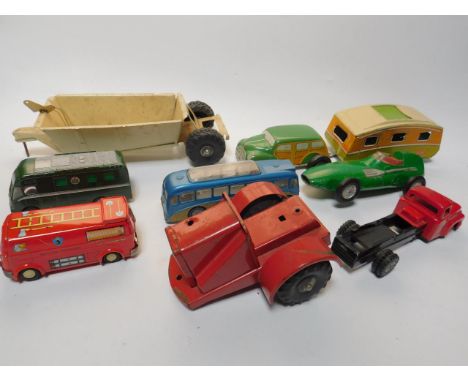 A British tin plate Mettoy travelling car and caravan, and other toy vehicles including a Mettoy Bus, Dinky TV Mobile Control