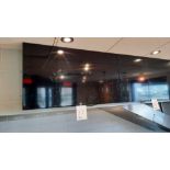 Wall-Mounted Menu TV