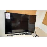 LG TV, c/w Wall-Mounted Bracket