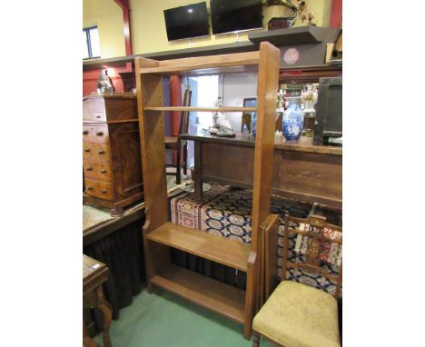 A Robert 'Mouseman' Thompson of Kilburn oak tall bookcase with open back. Fixed lower two tier shelved section with adjustabl