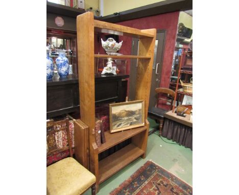 A Robert 'Mouseman' Thompson of Kilburn oak tall bookcase with open back. Fixed lower two tier shelved section with adjustabl