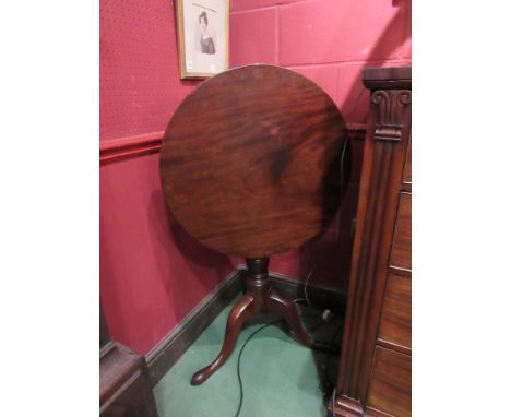 A George III mahogany tilt top occasional table with turned columns to tripod base top 62cm diameter  