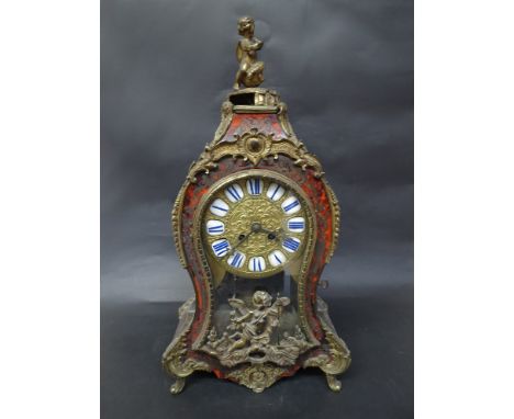 A 19th Century French Boulle work and tortoiseshell mantel clock with ormolu embellishments with Japy Freres movement, 49cm t