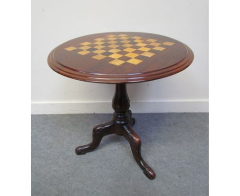 A 19th Century circular chequerboard inlaid table on carved fluted column to carved tripod base 