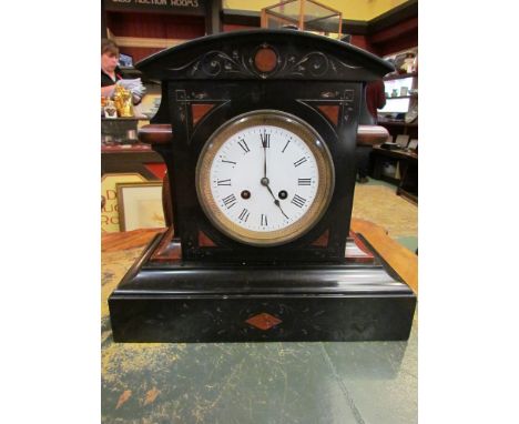 A slate and rouge marble mantel clock with Roman numerated chapter rings with key 