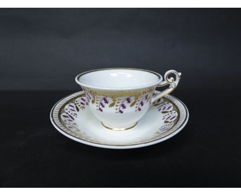 A Spode bell shape tea cup with saucer, the gilt foliate border with puce hairbell decoration, pattern No. 3217